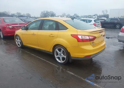 2012 Ford Focus Titanium z USA, uszkodzony, nr VIN 1FAHP3J26CL345722